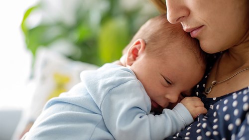 Woman holding a baby